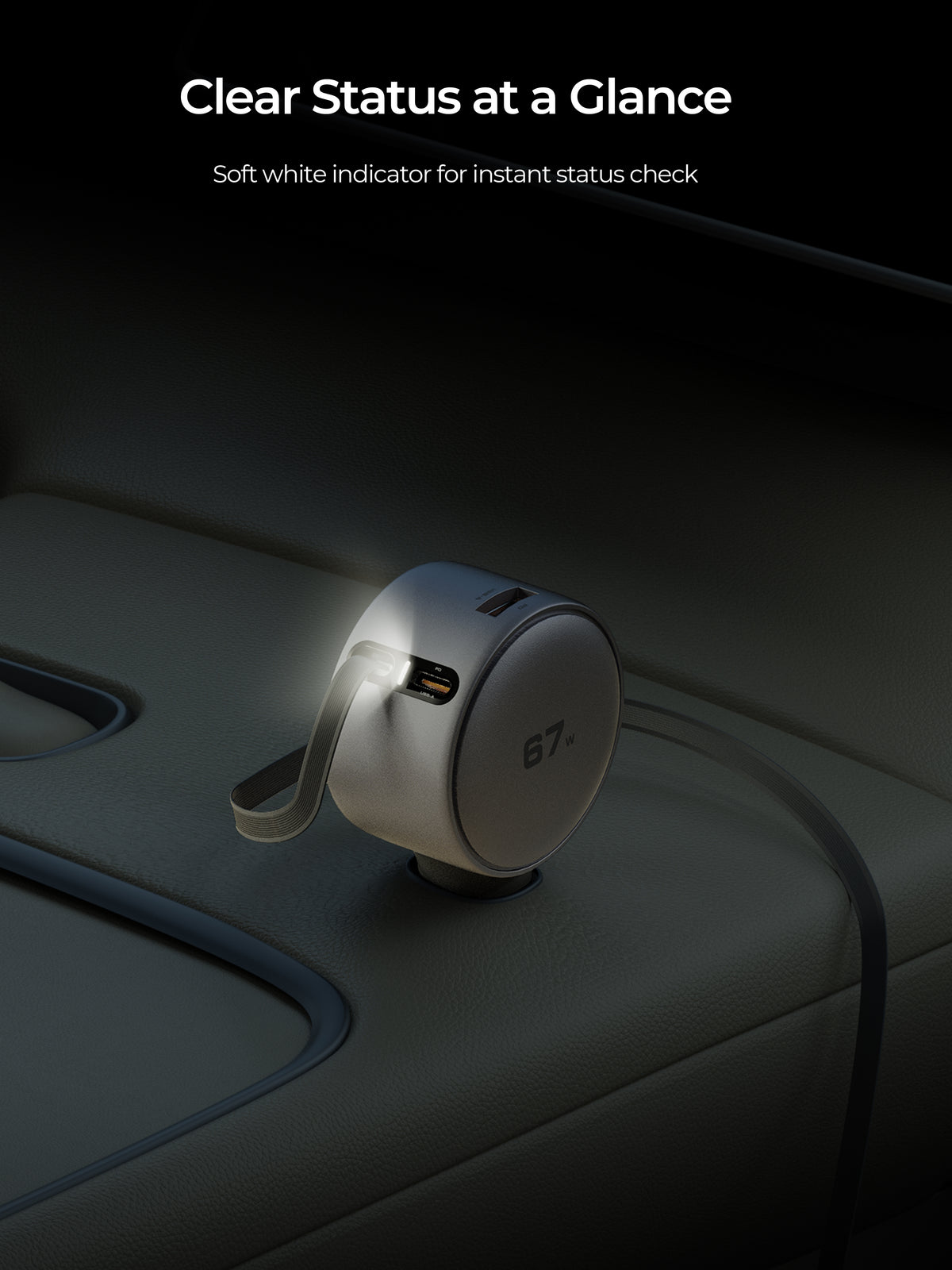 A small round white electronic device with a loop strap and a visible USB-C port, shown plugged into a dark car interior outlet. Text at the top reads 'Clear Status at a Glance' and 'Soft white indicator for instant status check.